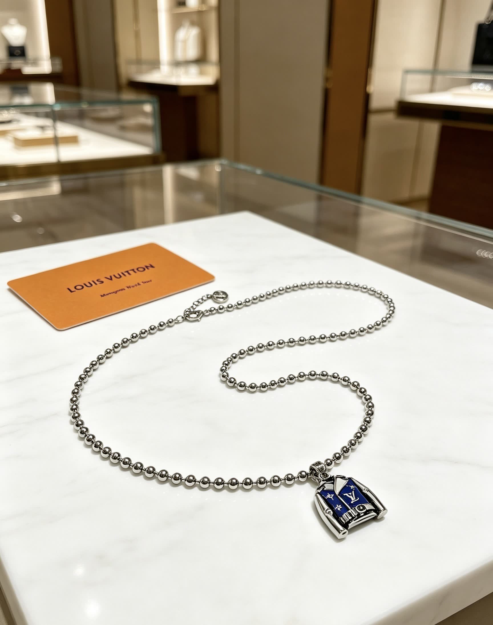 Louis Vuitton Silver Beaded Necklace with Blue Enamel Charm